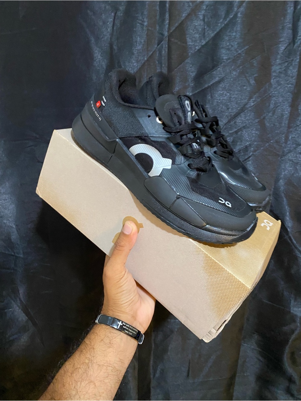 On  the Roger pro2 Black Men's Athletic Sneakers with White Logo